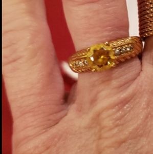 Beautiful gold topaz ring from QVC. Brand new. Size 7 to 7 1/2